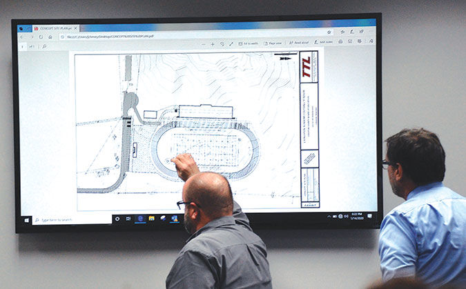 Building committee moves ahead with stadium plans
